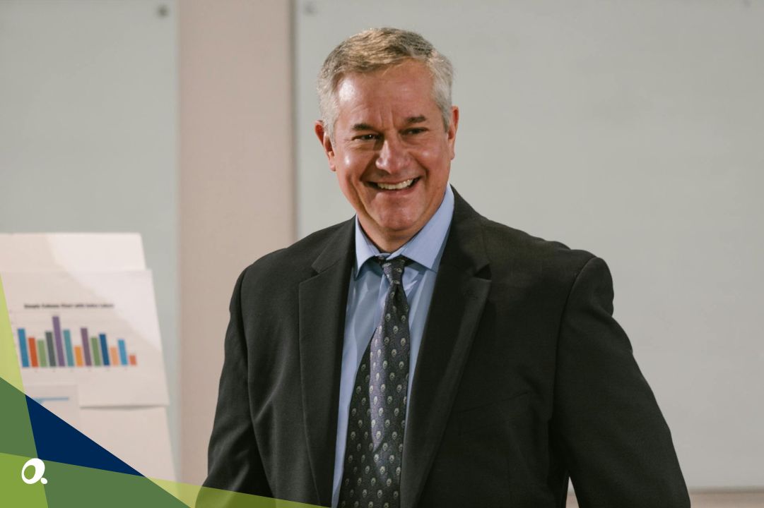 Confident finance leader presenting results, illustrating the benefits of a faster financial close.