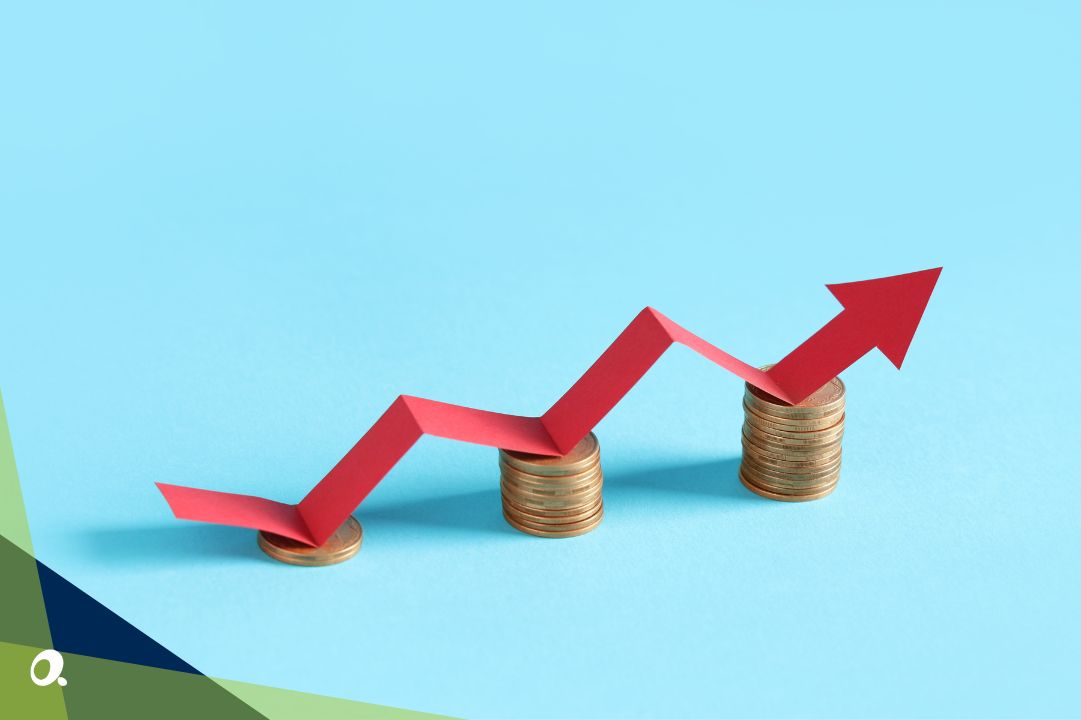 Stacked coins with an upward red arrow showing increasing maintenance costs for businesses still using Sage 1000.