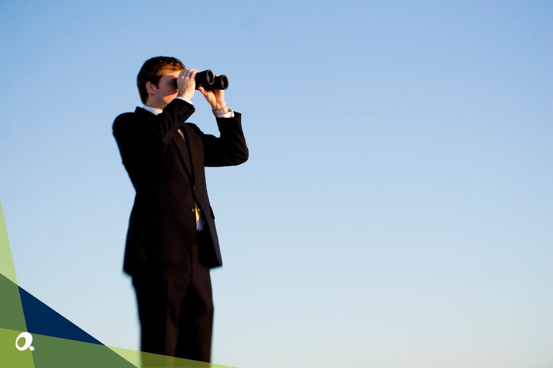 Business leader looking ahead with binoculars, symbolising the search for a Xero replacement.
