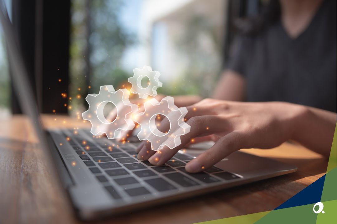 Finance professional using a laptop with graphics of efficiency